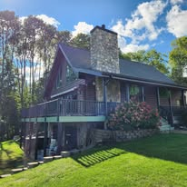 Stone, stain and trim work on a Northwoods log home.